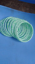 Naira-White-Beaded bracelets