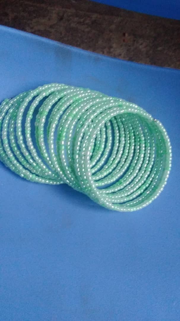 Naira-White-Beaded bracelets